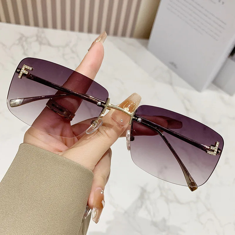 Ruiao rimless sunglasses UV400 fashion square metal glasses for women diamond y2k small face sun glasses 250509