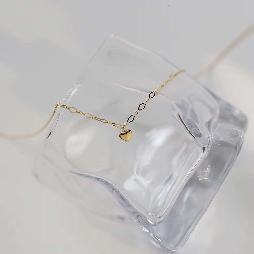 Stainless steel engraved chain cute pendant with heart-shaped design, gold lock bone jewelry for girls, short necklace