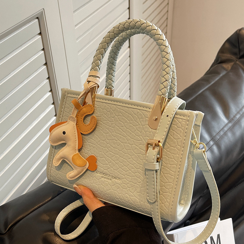 Simplified Textured Summer Handbag: Compact Messenger Tote Ideal for Everyday Use Designer bag