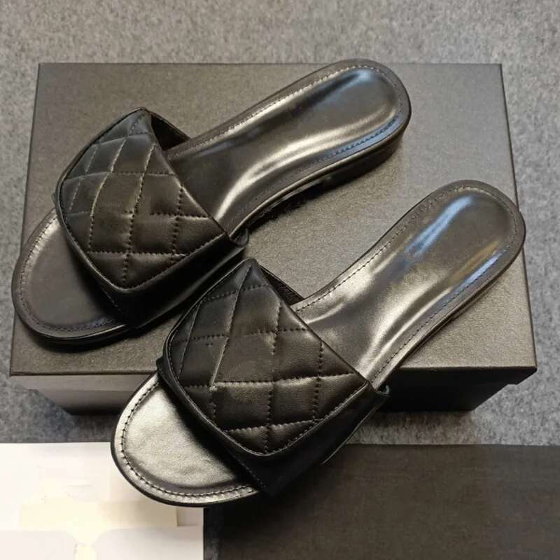 Brand slippers 2025 Metal letter design sense sandals women's new leather high quality soles all match