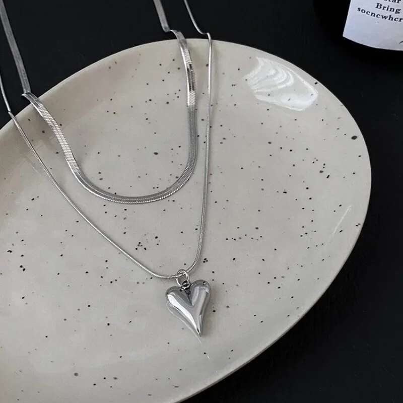 Double necklace with Laoloutian heart