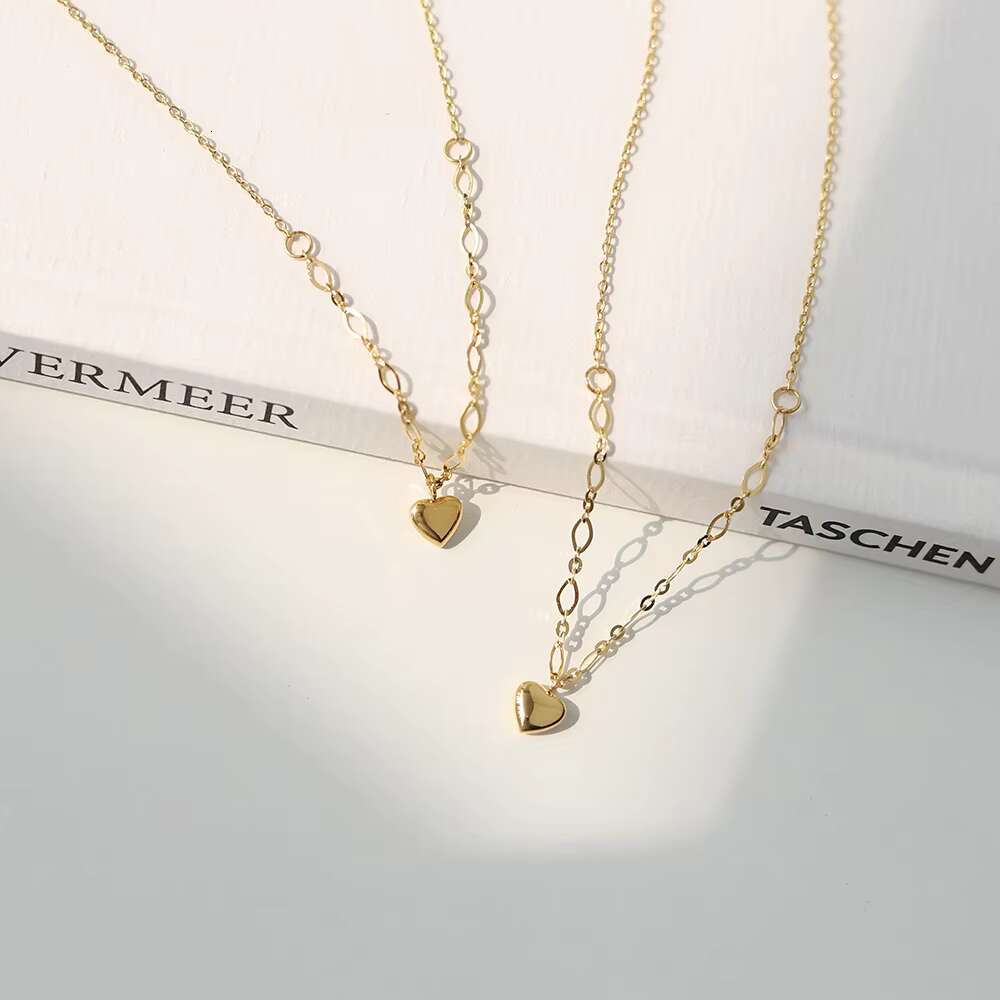 Stainless steel engraved chain cute pendant with heart-shaped design, gold lock bone jewelry for girls, short necklace