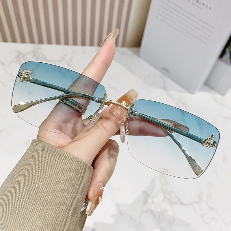 Ruiao rimless sunglasses UV400 fashion square metal glasses for women diamond y2k small face sun glasses 250509