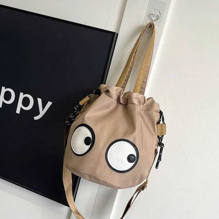 New Forest style waterproof nylon bag with quirky big eyes personalized handbag diagonal cross bag small tote bag bucket bag Z250512