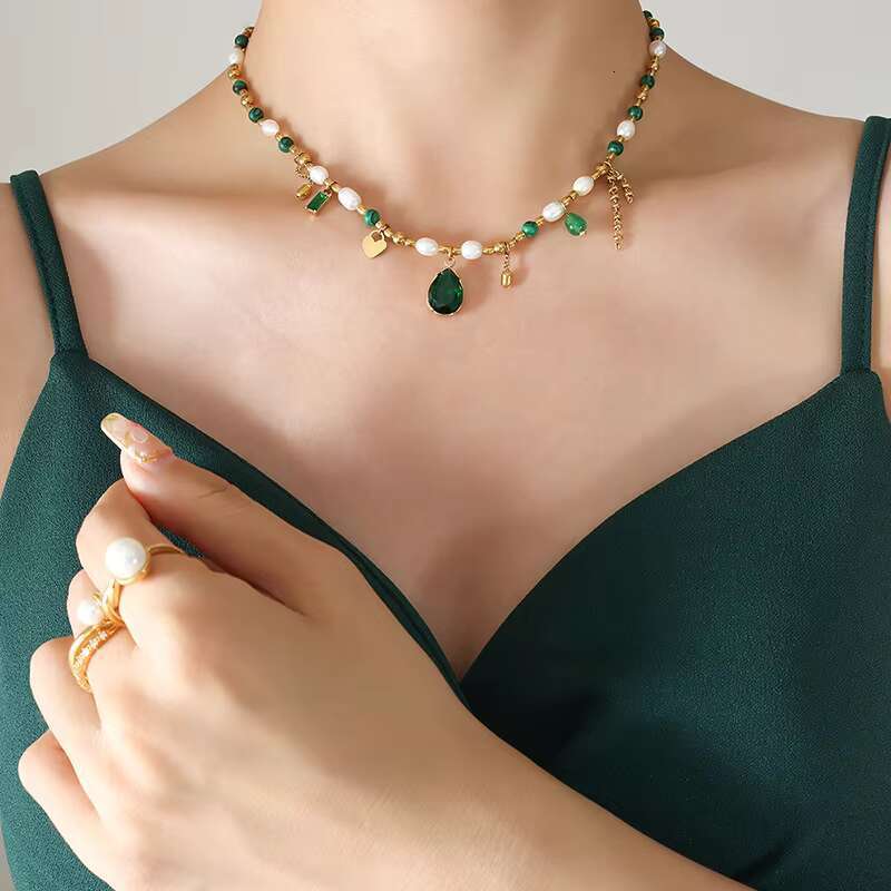 Elegant stainless steel necklace, women's gold-plated pearl zircon pendant, and fashionable chain buckle