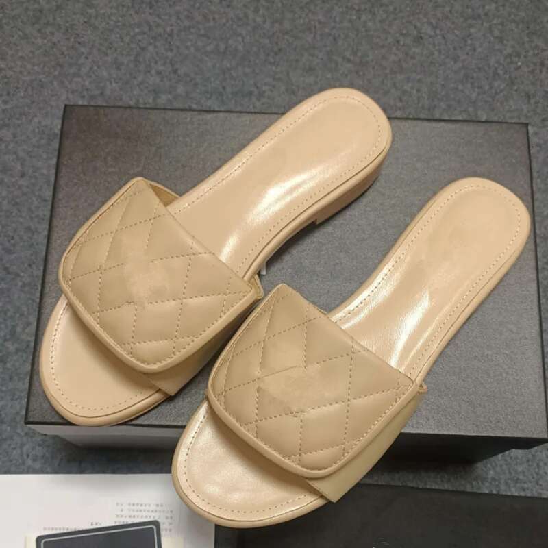 Brand slippers 2025 Metal letter design sense sandals women's new leather high quality soles all match