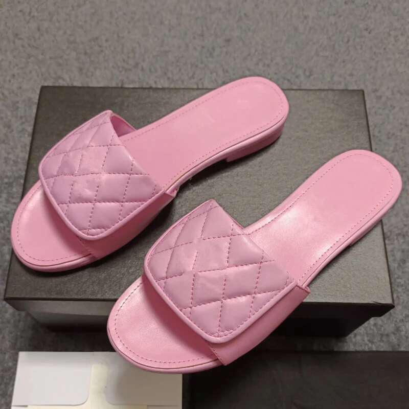 Brand slippers 2025 Metal letter design sense sandals women's new leather high quality soles all match