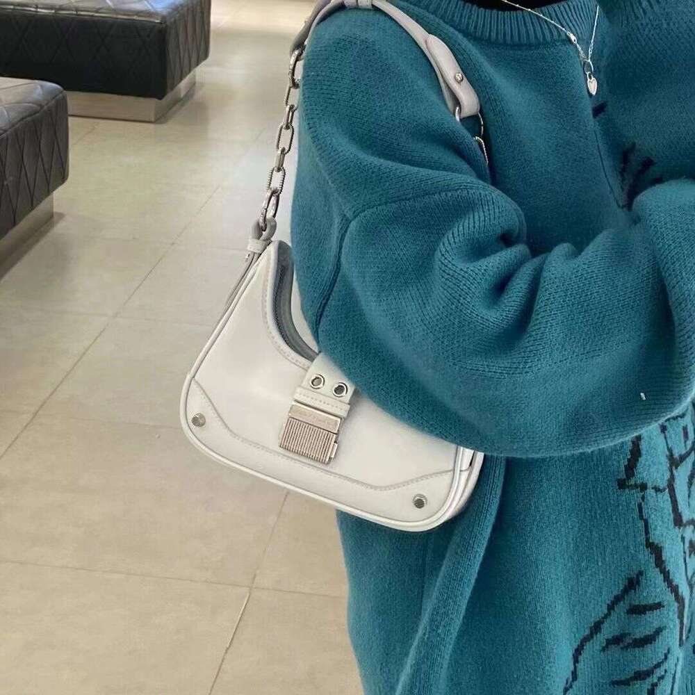 Spring and summer new chain 2025 niche crescent high-end splicing shoulder commuting crossbody bag for women