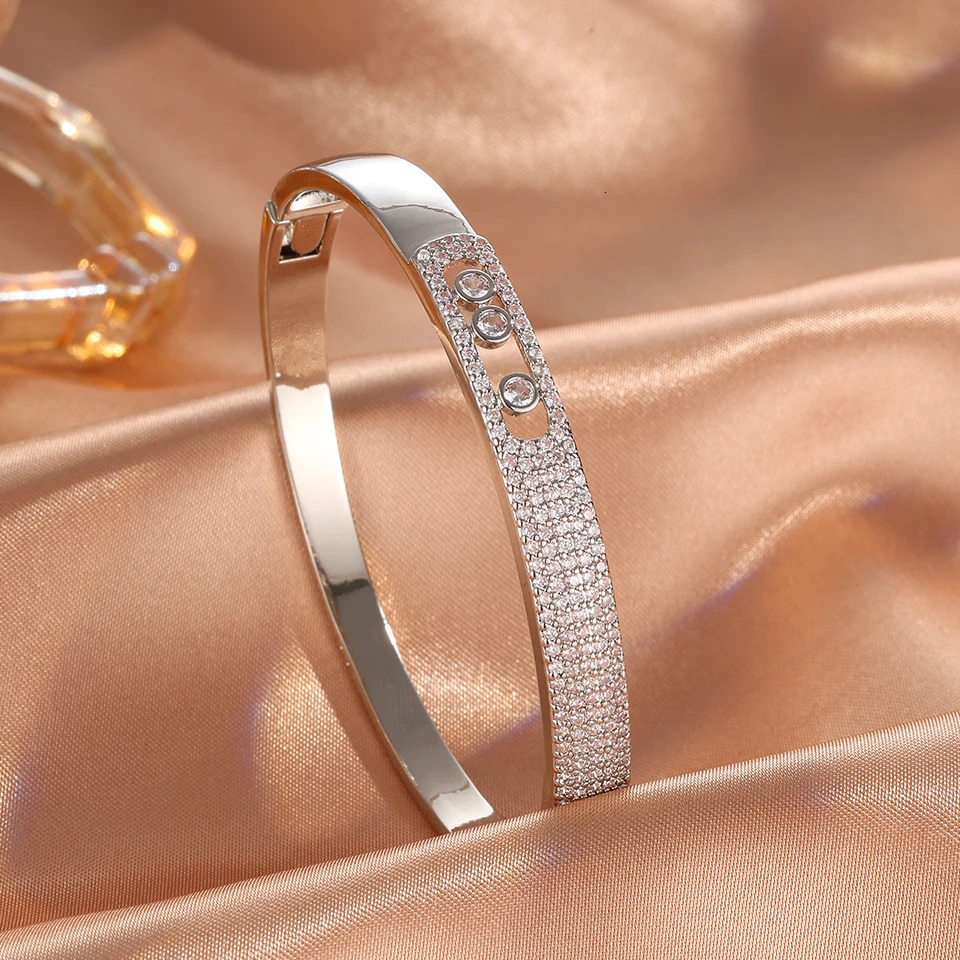 ZAKOL Niche n Micro Paved Cubic Zirconia Bangle Three Round Zircons Open Snap Bracelet Fashion Party Jewelry Gift 250512