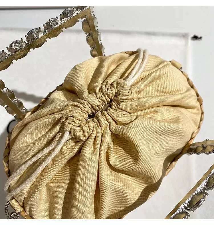 2025 New Women's Designer Bag Outdoor Leisure Bag Crystal Diaz Metal Handle Women's Handbag Straw Weaving Handmade Bucket Vacation Beach Bag
