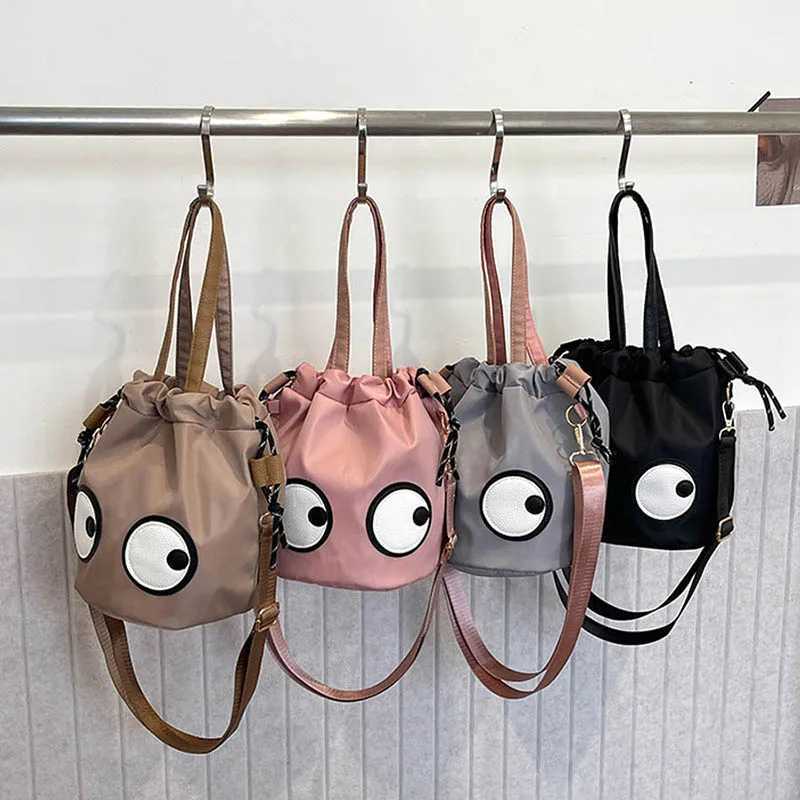 New Forest style waterproof nylon bag with quirky big eyes personalized handbag diagonal cross bag small tote bag bucket bag Z250512