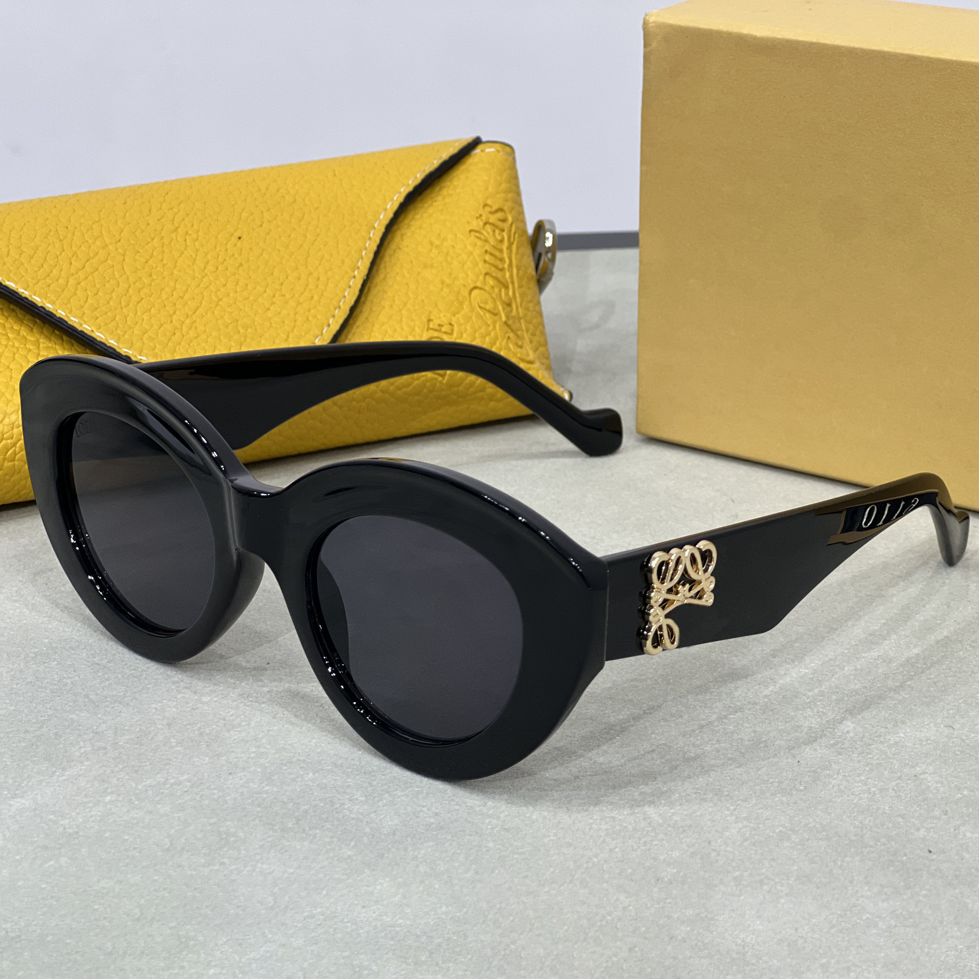 Loewesunglasselys Luxury Designer Cat Eye Sunglasses for Women - Irregular Frame Driving and Travel Glasses with Protective Case