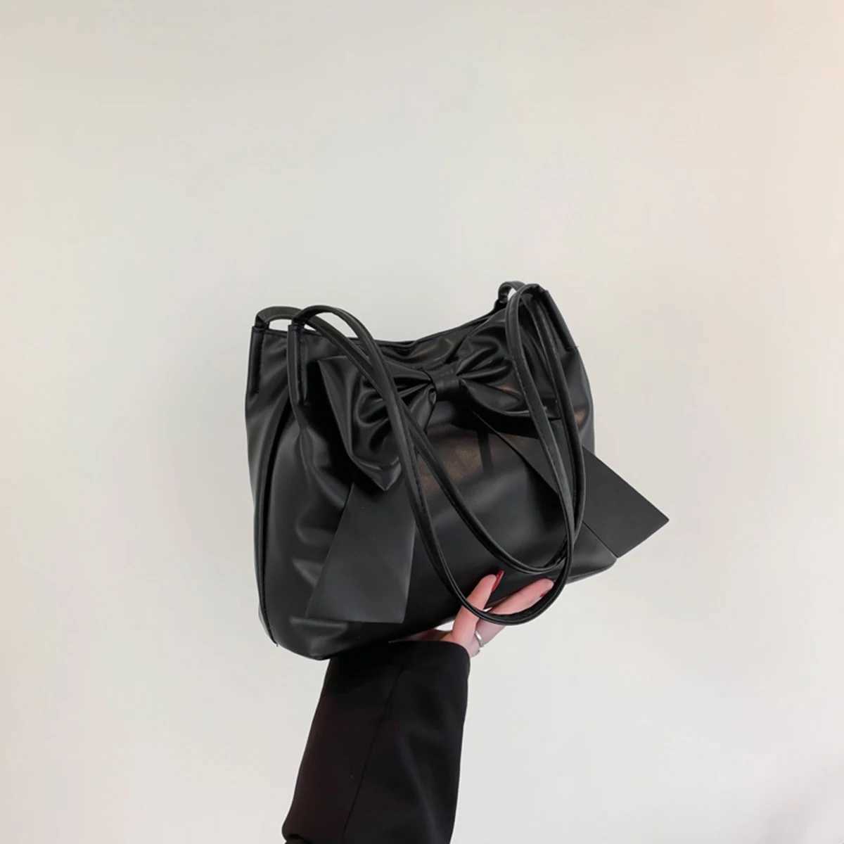 Black fashionable large-capacity bowknot tote underarm bag for women. Hong Kong style foreign and stylish all-match shoulder bag XJ250610