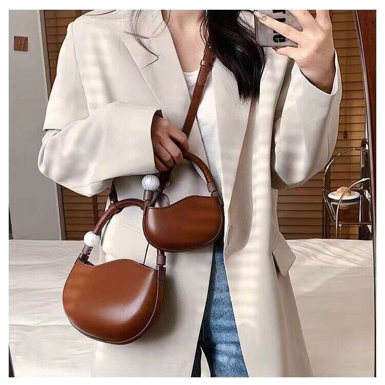 High end handbag for women's spring summer 2025 new item niche design pea bag fashionable and versatile hand-held shoulder