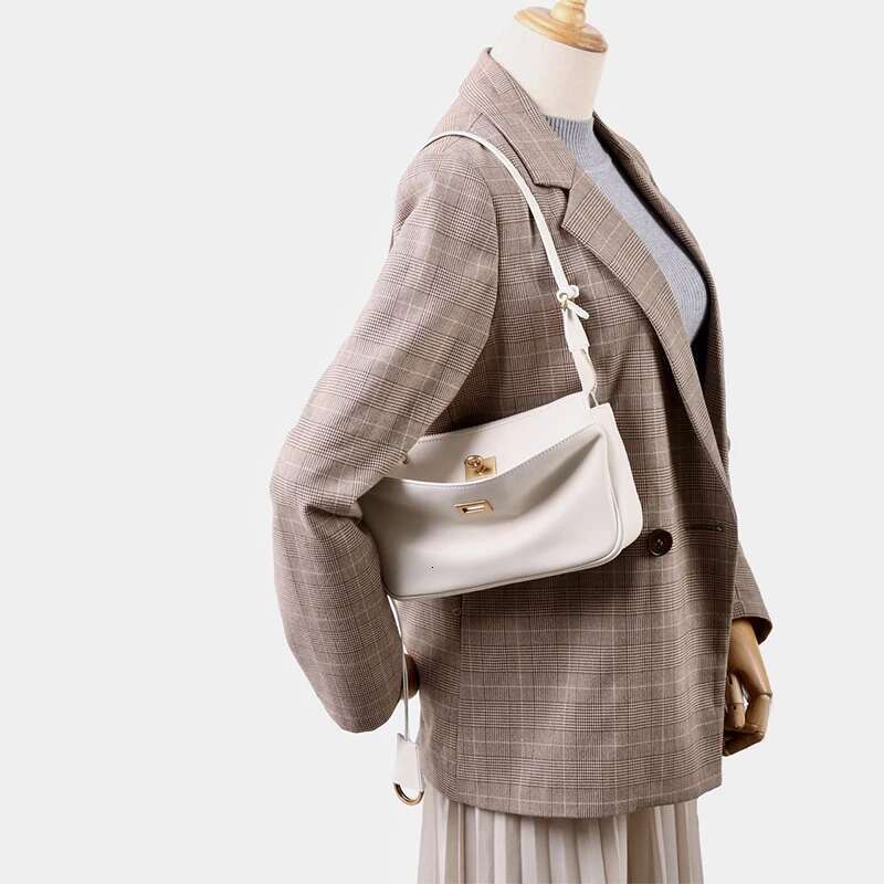 New Women's Small Square High-Quality Soft Leather Gold Sier Button Shoulder Messenger Versatile Underarm Bag