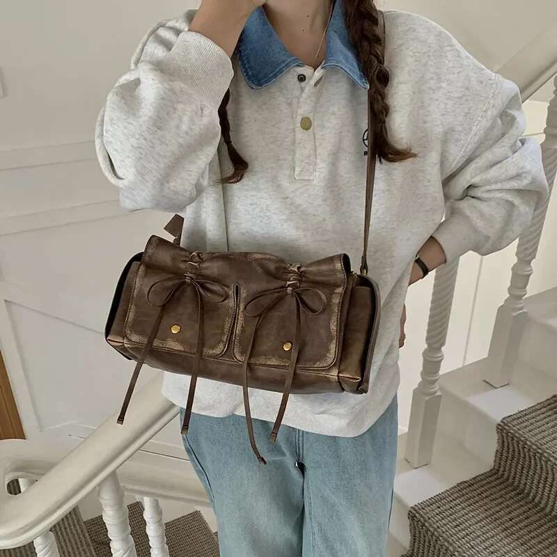 2024 New Designer Handbag Wallet Retro Wrinkle Shoulder Women's Motorcycle and Bicycle Pulling Rope Bow Bag