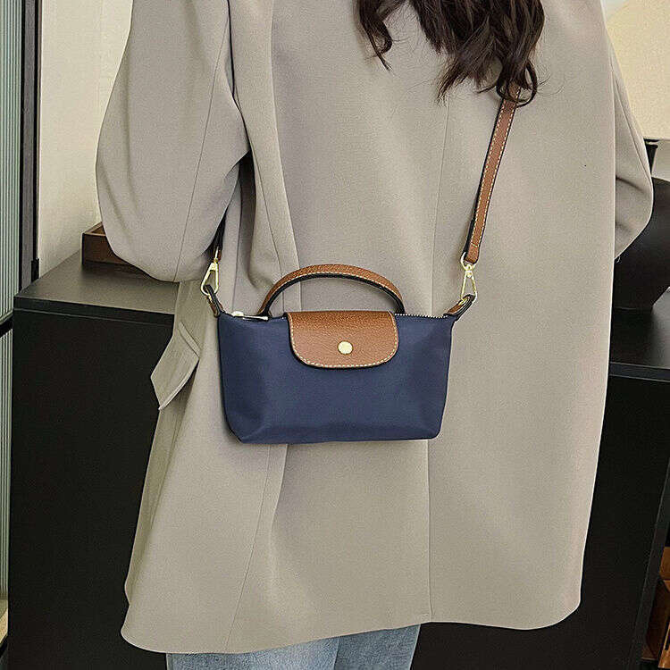 2025 New Commuter Cross Premium Texture Outdoor Single Handbag Exquisite Change Small Shoulder Bag