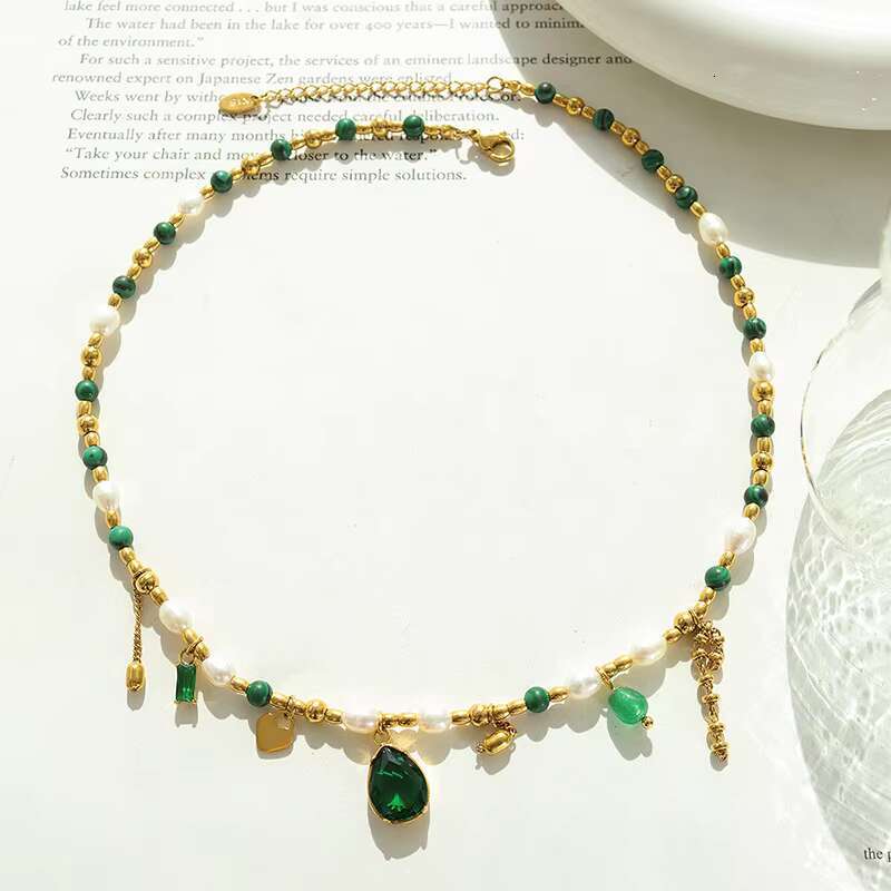 Elegant stainless steel necklace, women's gold-plated pearl zircon pendant, and fashionable chain buckle