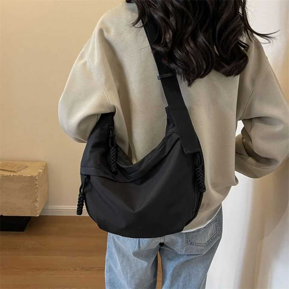 Dumpling Womens Messenger Bag 2025 Large Capacity Casual College Students Class Book Sports Shoulder Canvas Commuter BagW250512