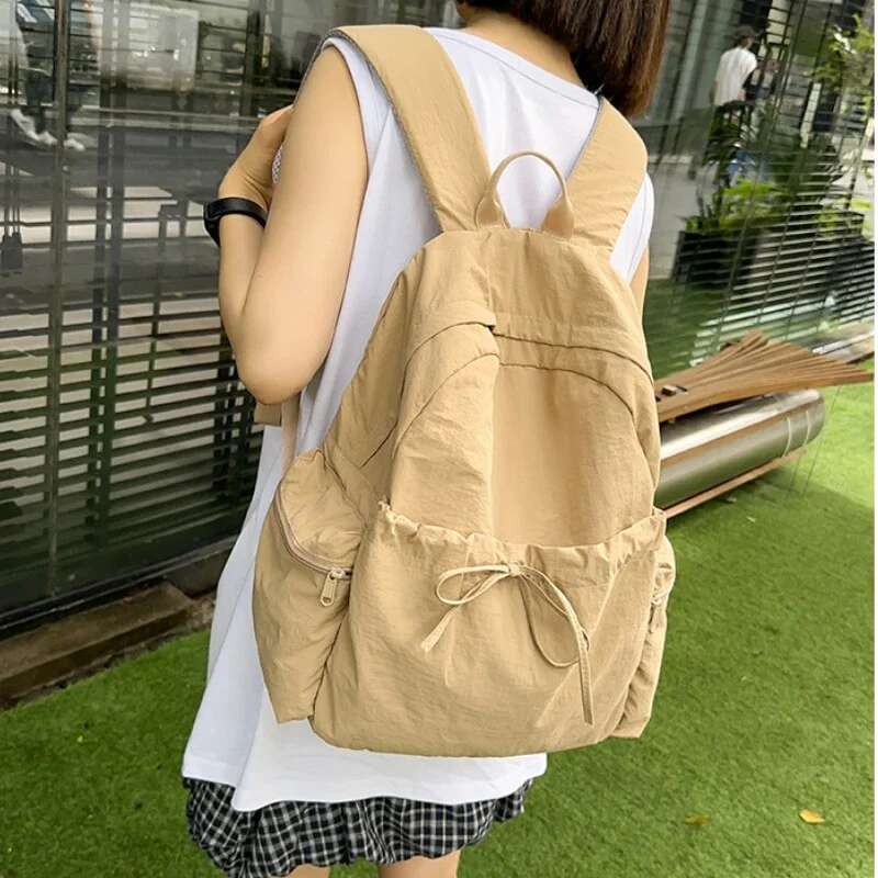 New Student Women's Japanese Style Lightweight and Fashionable Solid Color Simple Bow Casual Travel Backpack