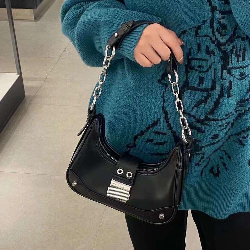 Spring and summer new chain 2025 niche crescent high-end splicing shoulder commuting crossbody bag for women