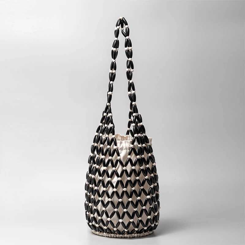 Wooden Bead Woven Bag New Design Womens Hollow Beaded Seaside Travel Versatile Hand-held Shoulder Underarm Bucket Bag Z250512