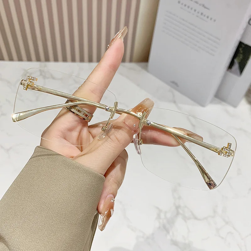 Ruiao rimless sunglasses UV400 fashion square metal glasses for women diamond y2k small face sun glasses 250509
