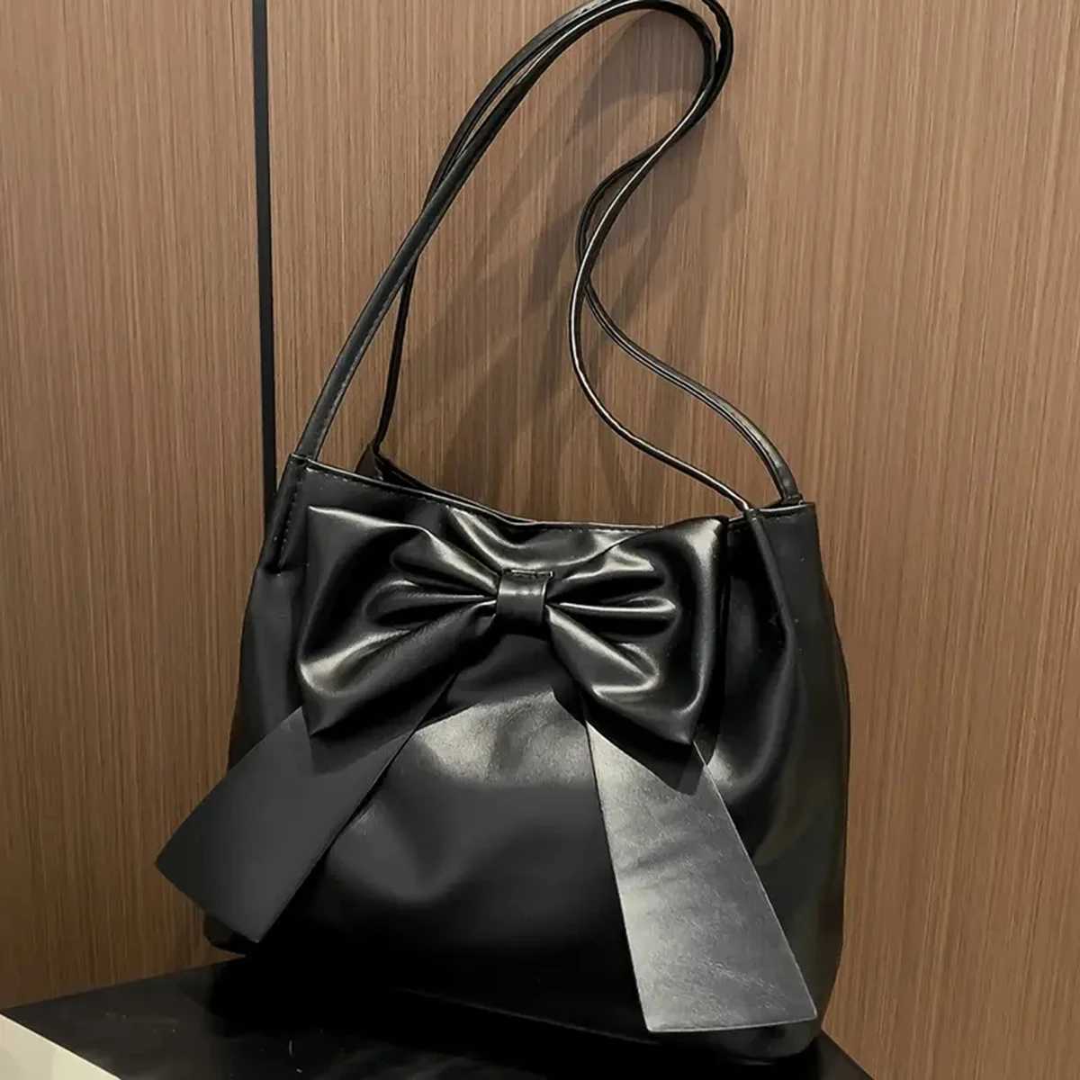 Black fashionable large-capacity bowknot tote underarm bag for women. Hong Kong style foreign and stylish all-match shoulder bag XJ250610