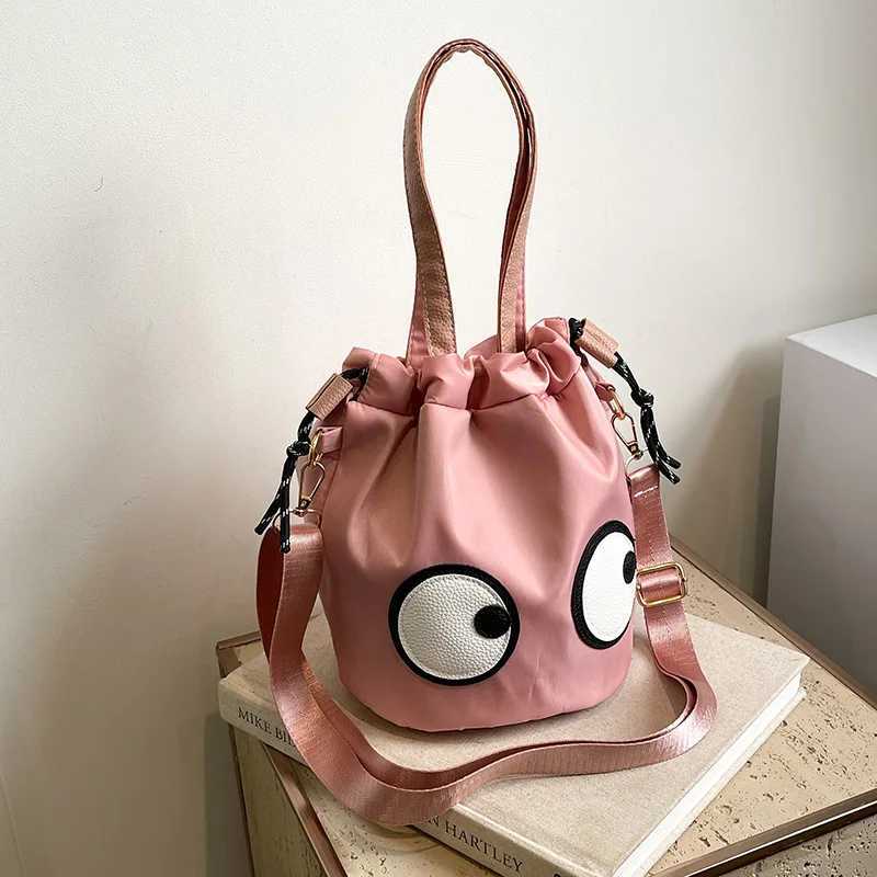 New Forest style waterproof nylon bag with quirky big eyes personalized handbag diagonal cross bag small tote bag bucket bag Z250512