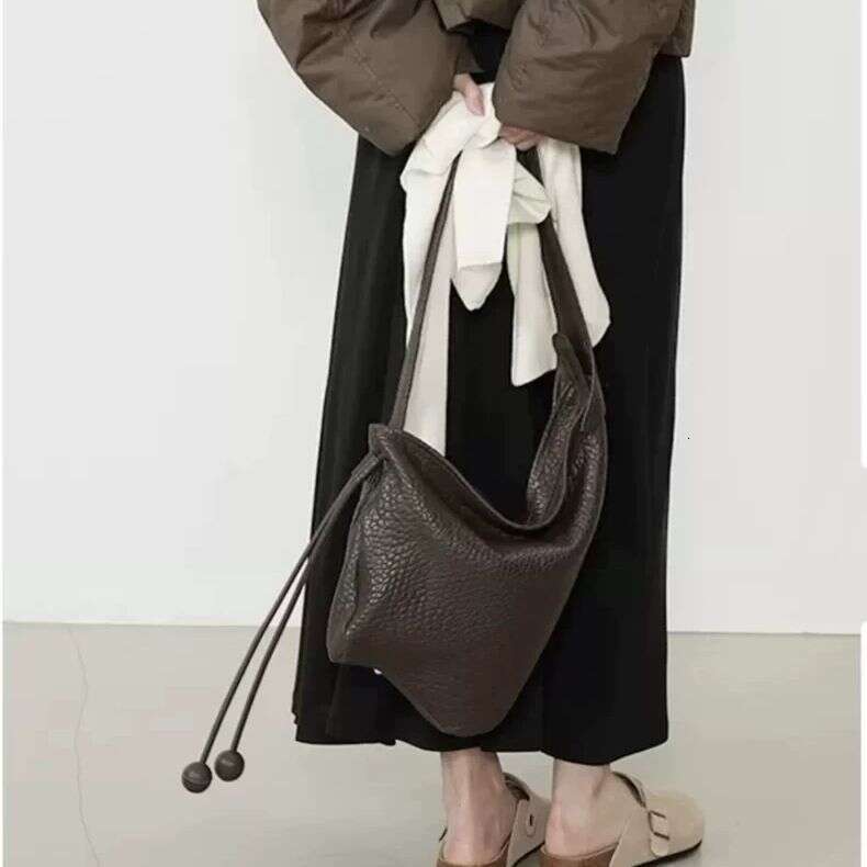 Soft leather lychee pattern niche lazy style large capacity versatile crossbody armpit casual bag