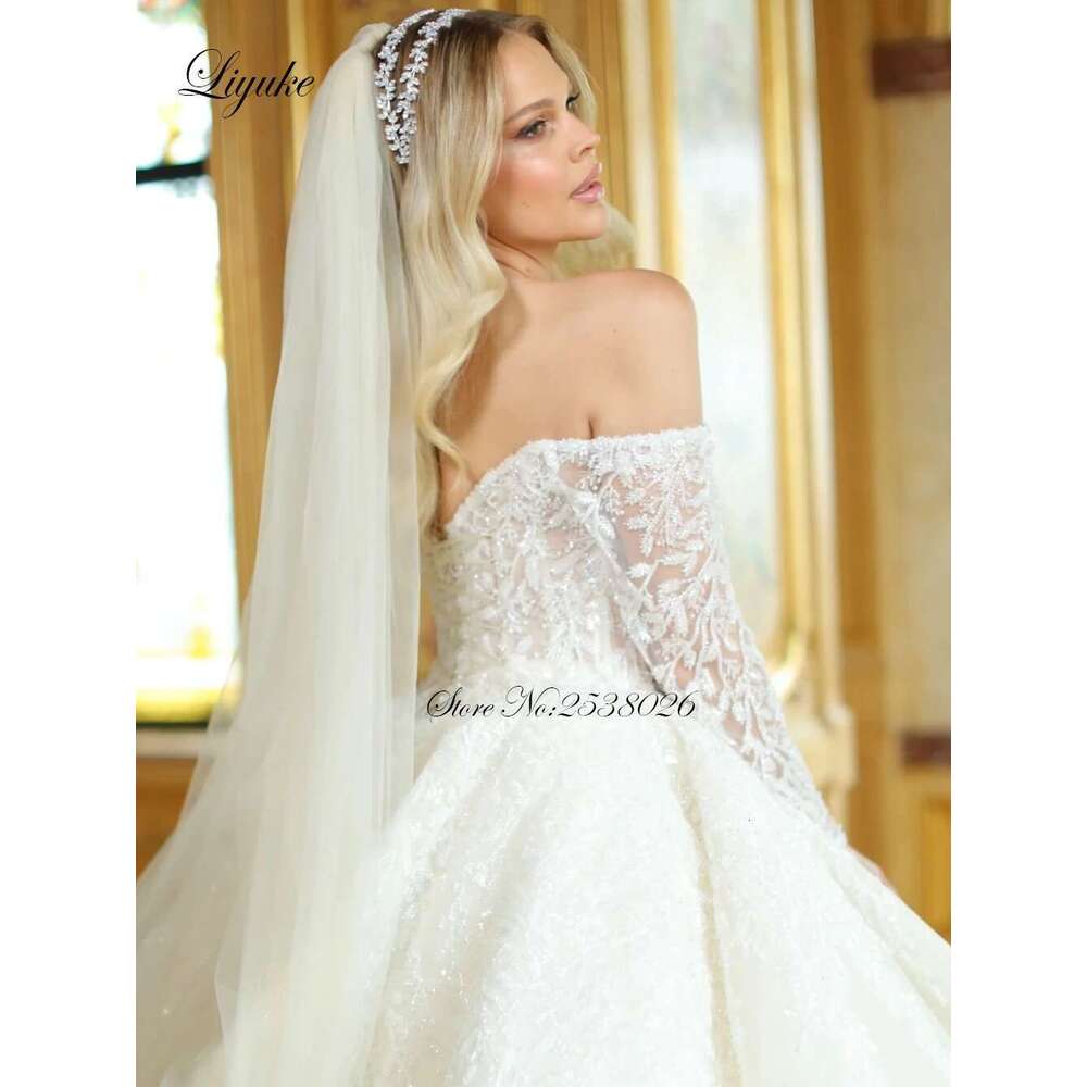 Liyuke Beauty Beading Pearls Ball Gown Princess Wedding dress Off Shoulder Full Sleeves Sparking Lace Court Train Bridal Gowns
