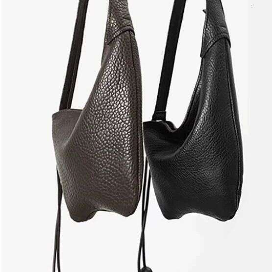 Soft leather lychee pattern niche lazy style large capacity versatile crossbody armpit casual bag