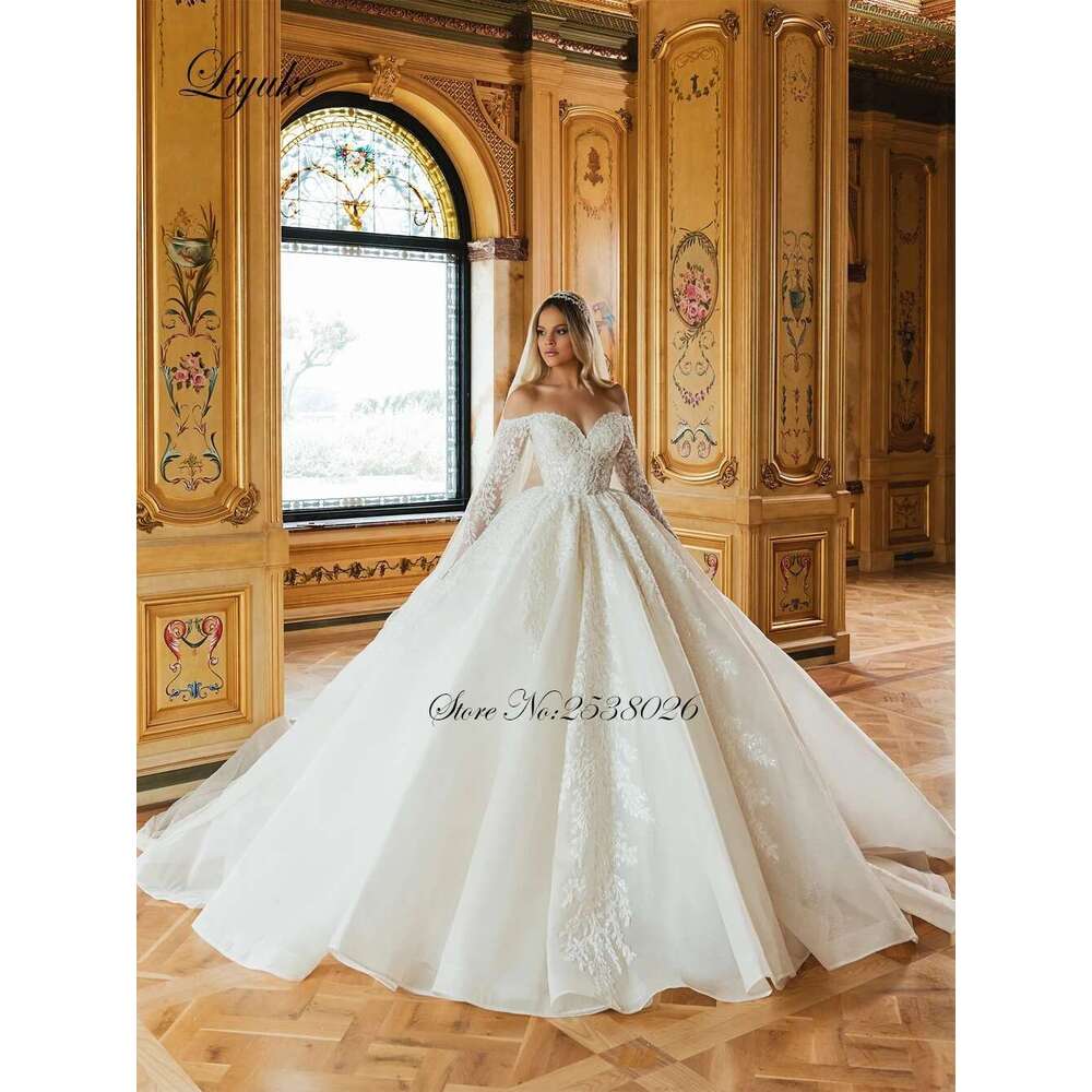 Liyuke Beauty Beading Pearls Ball Gown Princess Wedding dress Off Shoulder Full Sleeves Sparking Lace Court Train Bridal Gowns