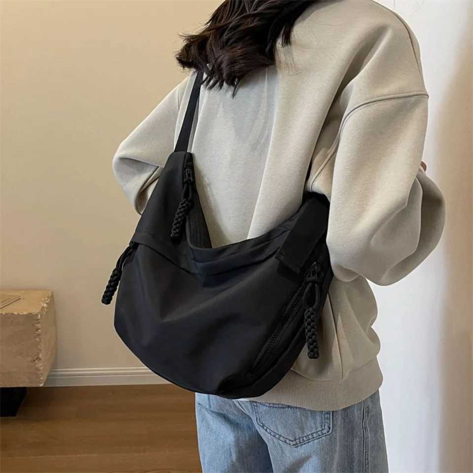 Dumpling Womens Messenger Bag 2025 Large Capacity Casual College Students Class Book Sports Shoulder Canvas Commuter BagW250512