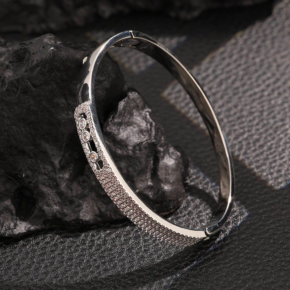 ZAKOL Niche n Micro Paved Cubic Zirconia Bangle Three Round Zircons Open Snap Bracelet Fashion Party Jewelry Gift 250512