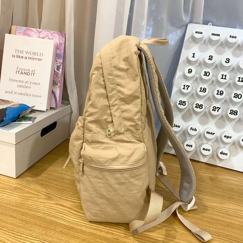 New Student Women's Japanese Style Lightweight and Fashionable Solid Color Simple Bow Casual Travel Backpack