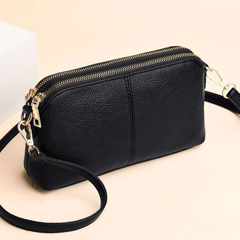 Handheld for women 2025 new fashion Korean version soft leather single shoulder versatile multi-layer small bag hand-held shell bag