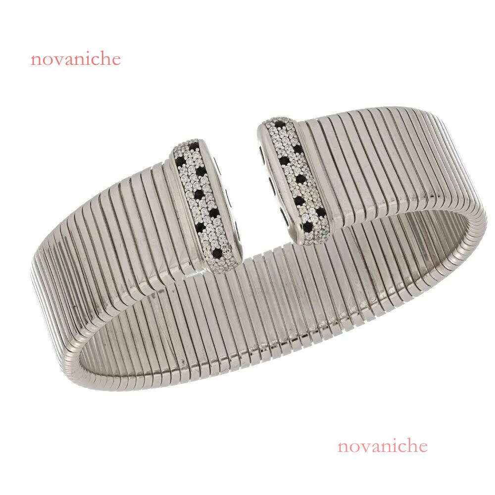 Made in Italy sier cuff bracelet, paired with black white paving details, bold and elegant