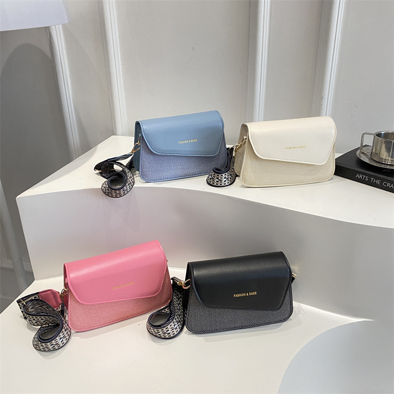 Extremely simple style hand-held small square women's 2025 summer new color blocked wide shoulder strap crossbody bag