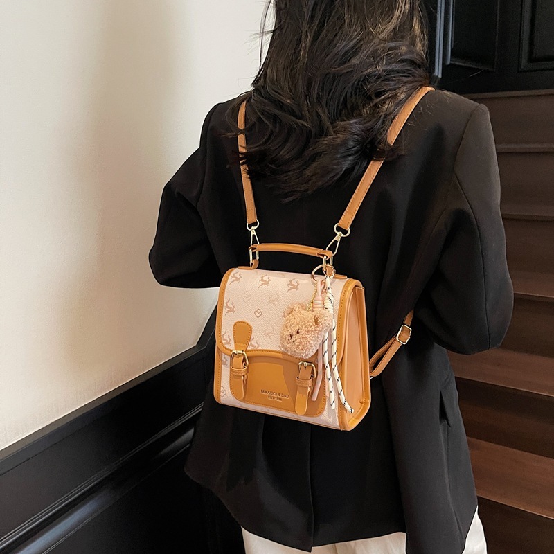 Korean version contrasting color hand-held small square women's 2025 summer new light luxury shoulder bag multifunctional backpack