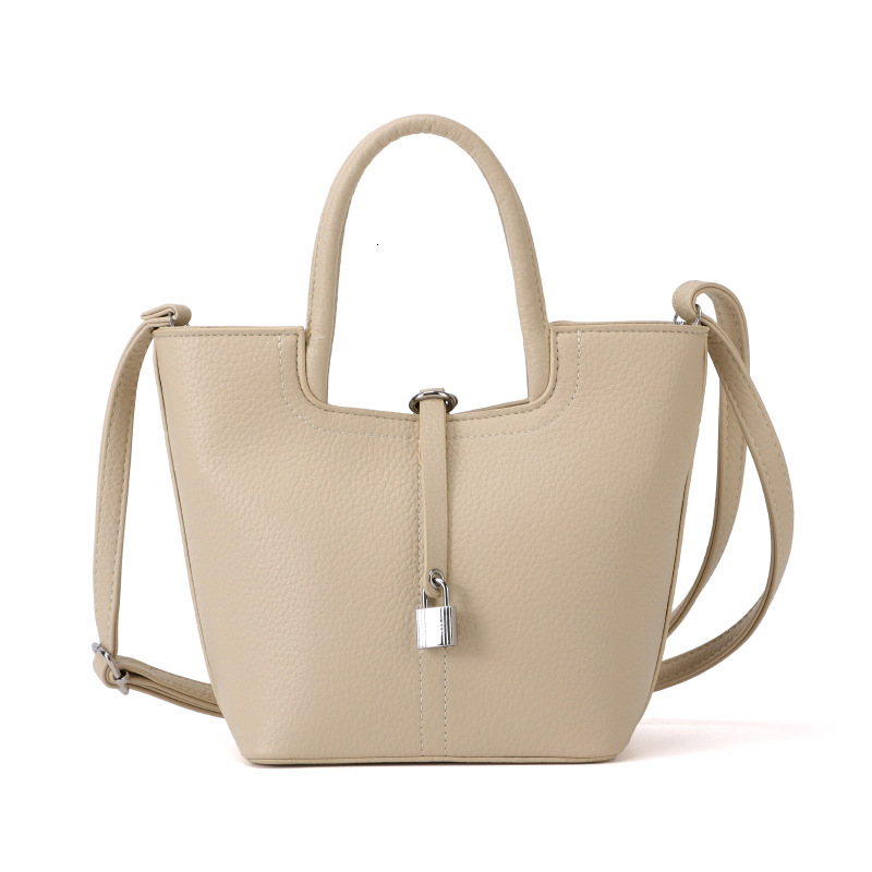Simple Handheld Bucket Korean Edition Western Style Shoulder Solid Color Commuter Crossover Women's Bag