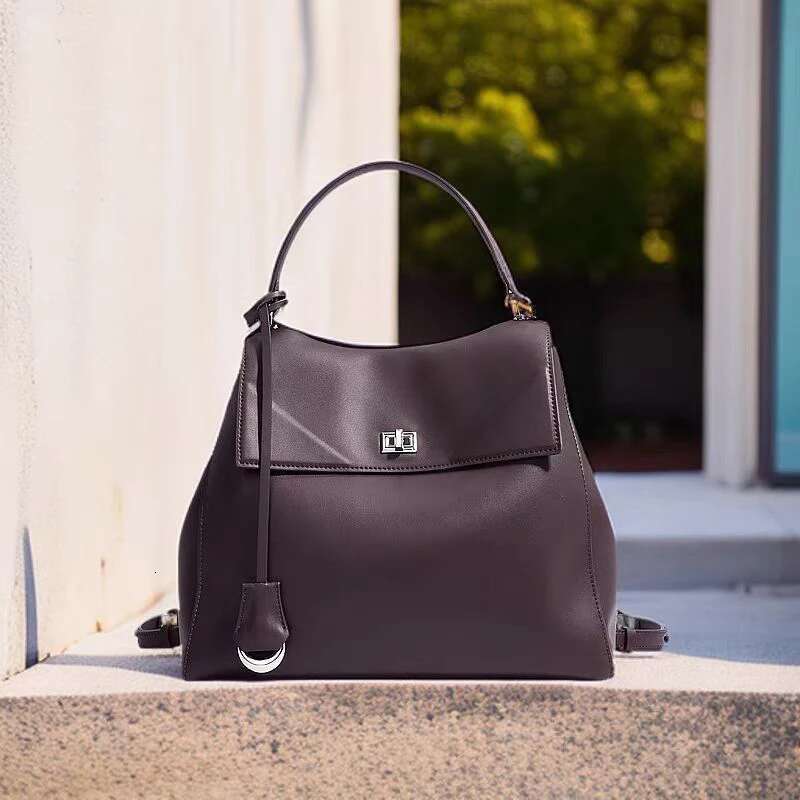 New Women's Backpack Sier Lock Cowhide Handbag Soft Fashion Niche Design Brand Tote Classic High-End Shoulder Bag