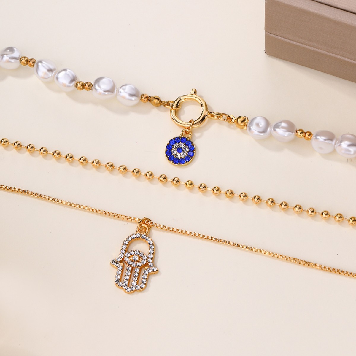 Trendy Layered Metal Necklace with Faux Eye Charm, Gold Pearl Choker for Women, Wholesale Fashion Jewelry