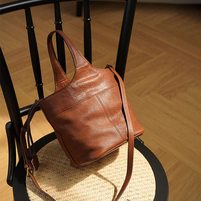 Genuine leather women's new niche handbag, commuting large capacity bucket bag, high-end sensory vegetable basket bag