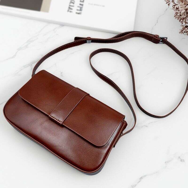 2025 new vegetable tanned genuine leather women's bag this year's solid color simple and fashionable single shoulder crossbody small square 