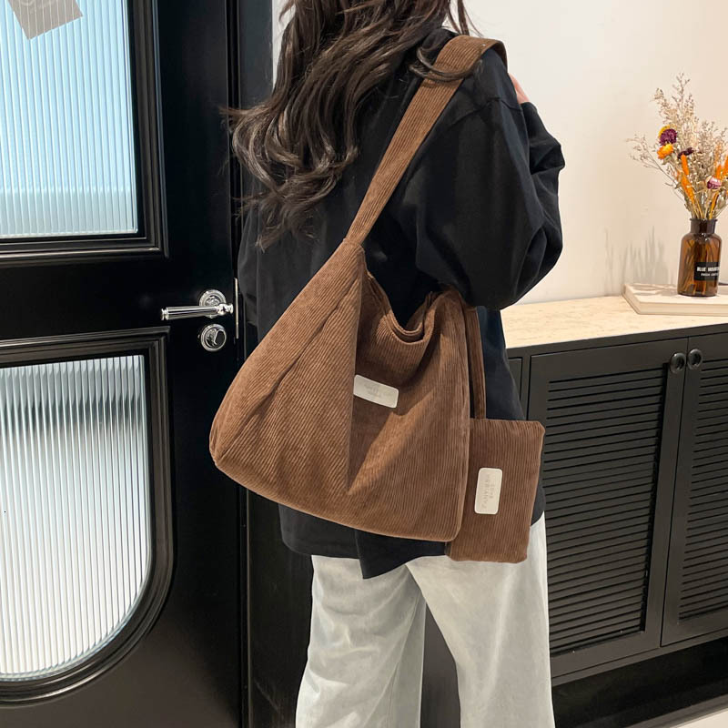 Handheld tote women's 2025 summer new large capacity shoulder trendy versatile crossbody mother bag