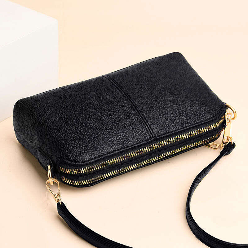 Handheld for women 2025 new fashion Korean version soft leather single shoulder versatile multi-layer small bag hand-held shell bag
