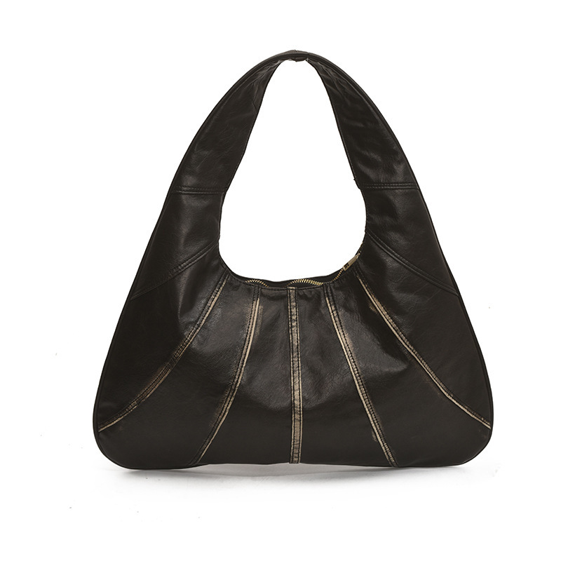 Niche design handbag women's 2025 summer new fashion splicing shoulder commuting armpit bag