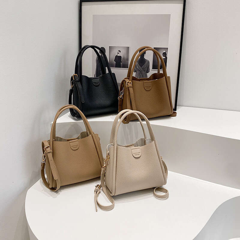 Litchi pattern hand-held bucket for women 2025 new Korean version, popular live streaming, high-end single shoulder crossbody bag