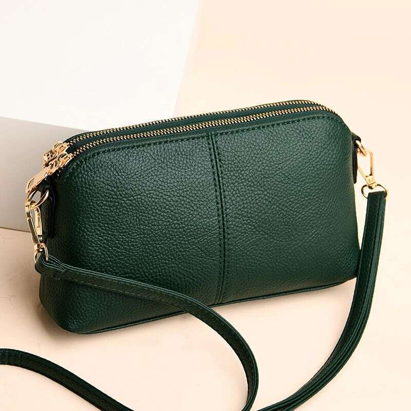 Handheld for women 2025 new fashion Korean version soft leather single shoulder versatile multi-layer small bag hand-held shell bag